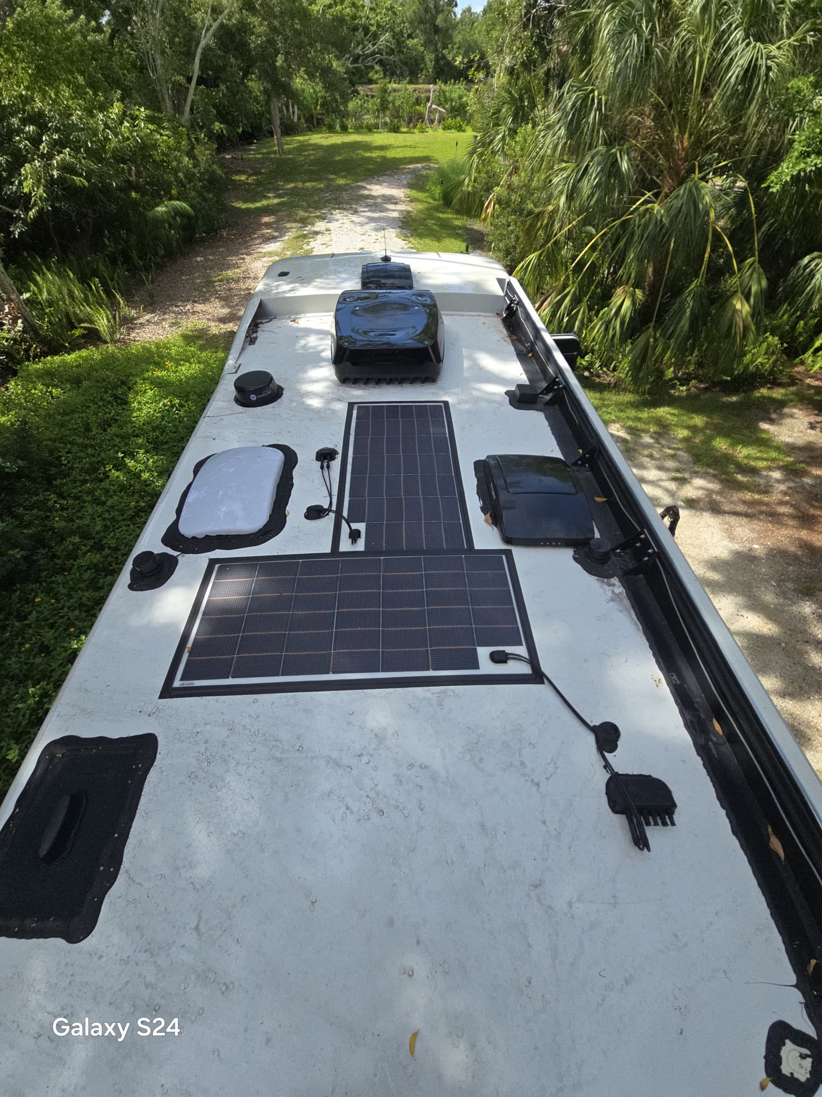 RV roof with solar panels and vents installed by Rudy's RV Repair in Sarasota, Florida