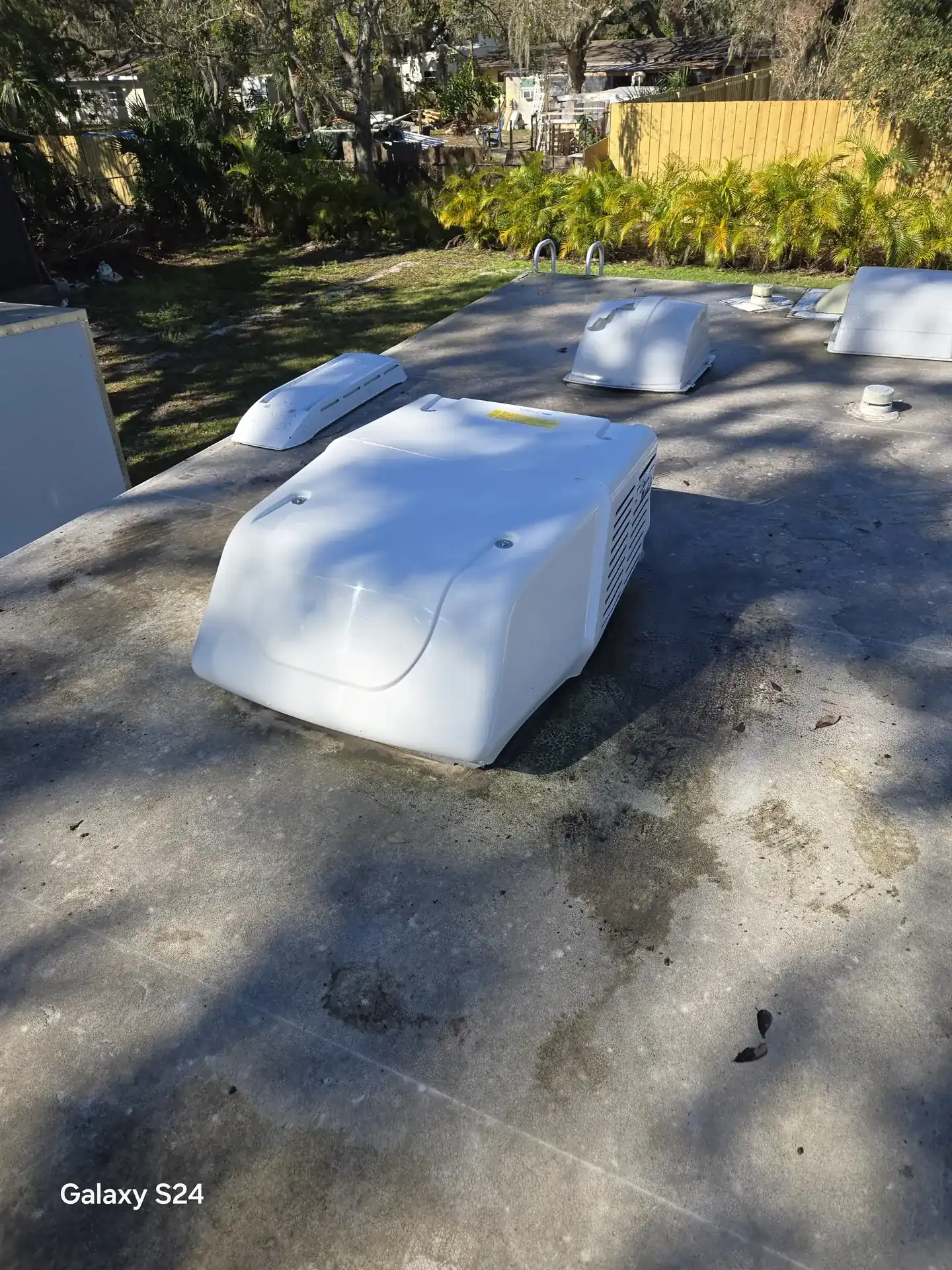 Newly installed rooftop air conditioner on an RV in Sarasota, Florida