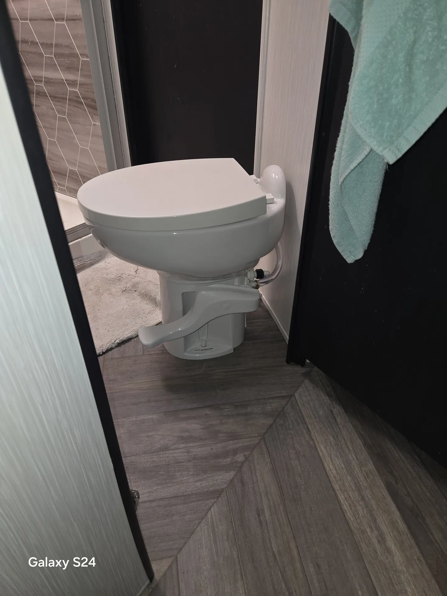 Newly installed RV toilet in a camper bathroom on Anna Maria Island, Florida